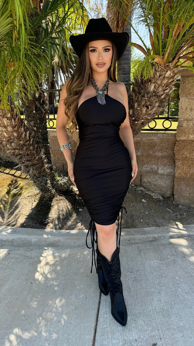black midi dress with black boots 6 Easy Black Dress and Boot Outfits For 2024